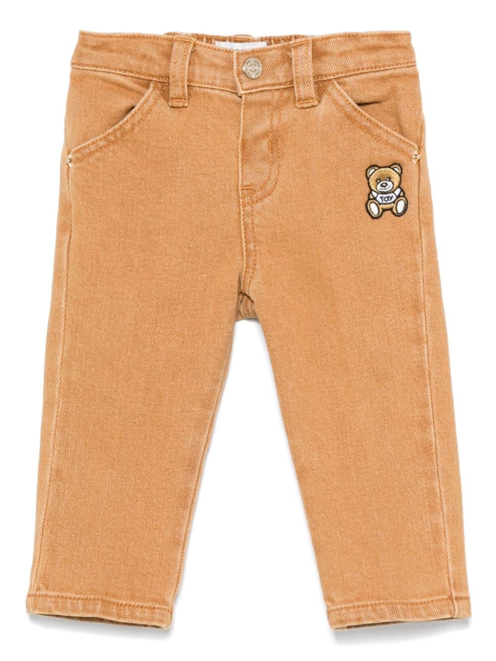 Jeans Leo Teddy per neonato Moschino Kids beige con passanti per cintura - Rubino Kids
