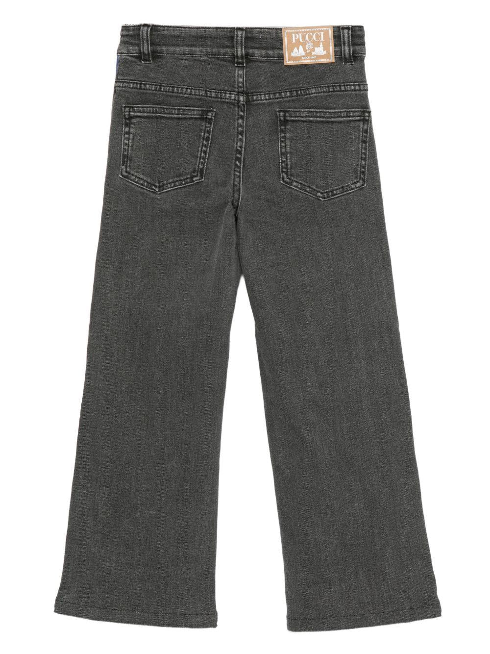 Jeans per bambina Emilio Pucci Junior in denim nero con stampa a righe laterali - Rubino Kids