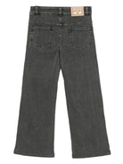 Jeans per bambina Emilio Pucci Junior in denim nero con stampa a righe laterali - Rubino Kids