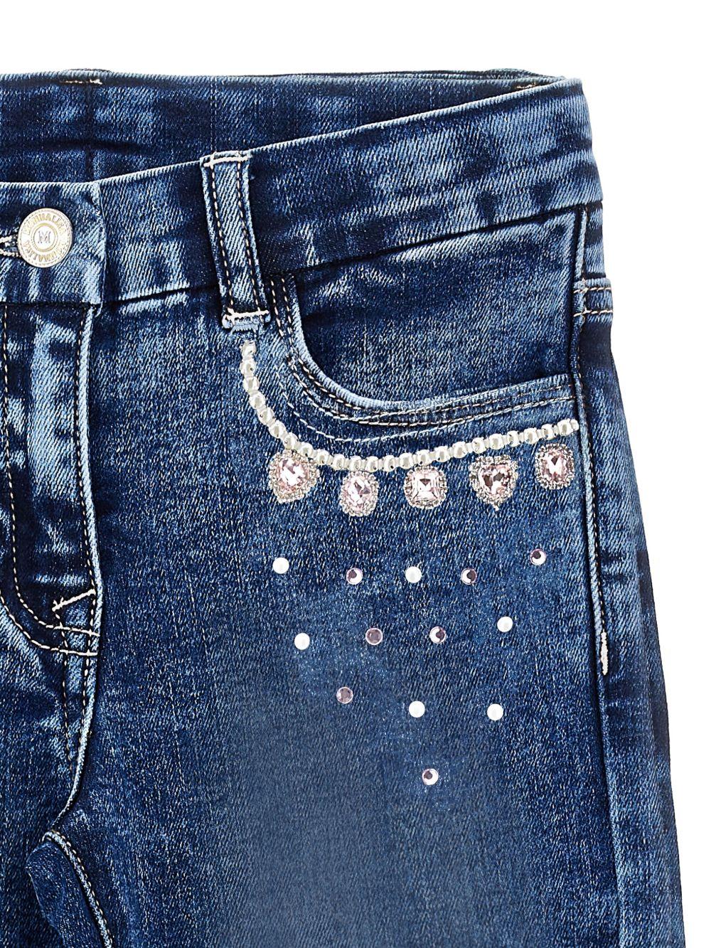 Jeans per bambina Monnalisa in denim modello svasati con decorazione - Rubino Kids