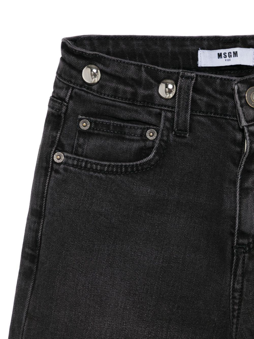Jeans per bambina MSGM Kids in denim nero con borchie sulla cintura - Rubino Kids