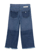 Jeans per bambina Stella McCartney Kids in denim blu con applicazione sul davanti - Rubino Kids