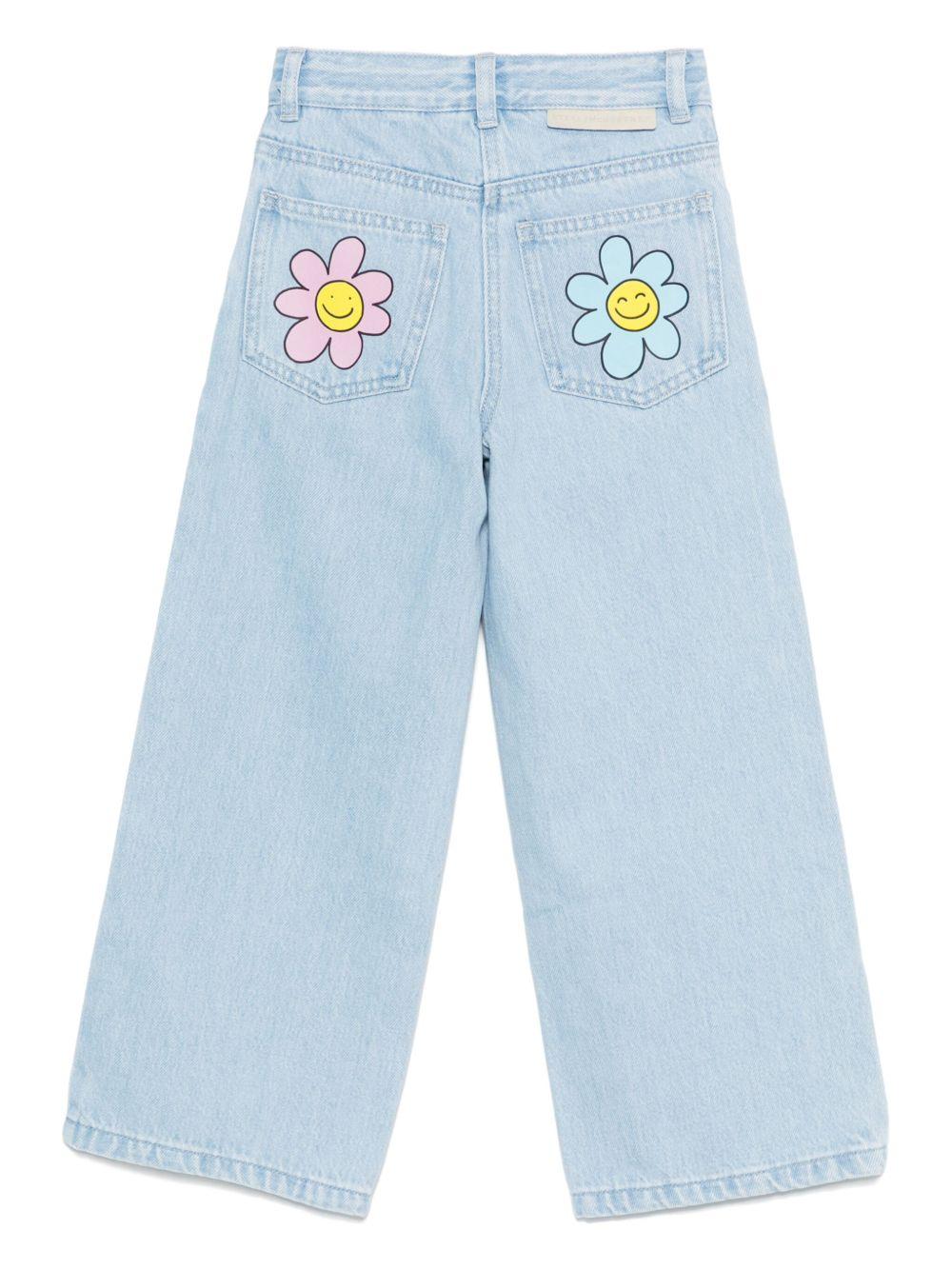 Jeans per bambina Stella McCartney Kids in denim con stampa floreale - Rubino Kids
