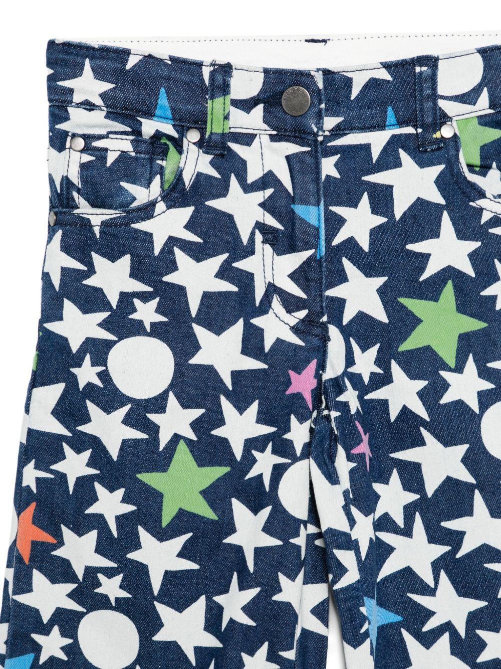 Jeans per bambina Stella McCartney Kids in denim con stelle all - over - Rubino Kids