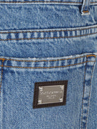 Jeans per bambino Dolce & Gabbana Kids in denim a gamba dritta con dettagli strappati - Rubino Kids