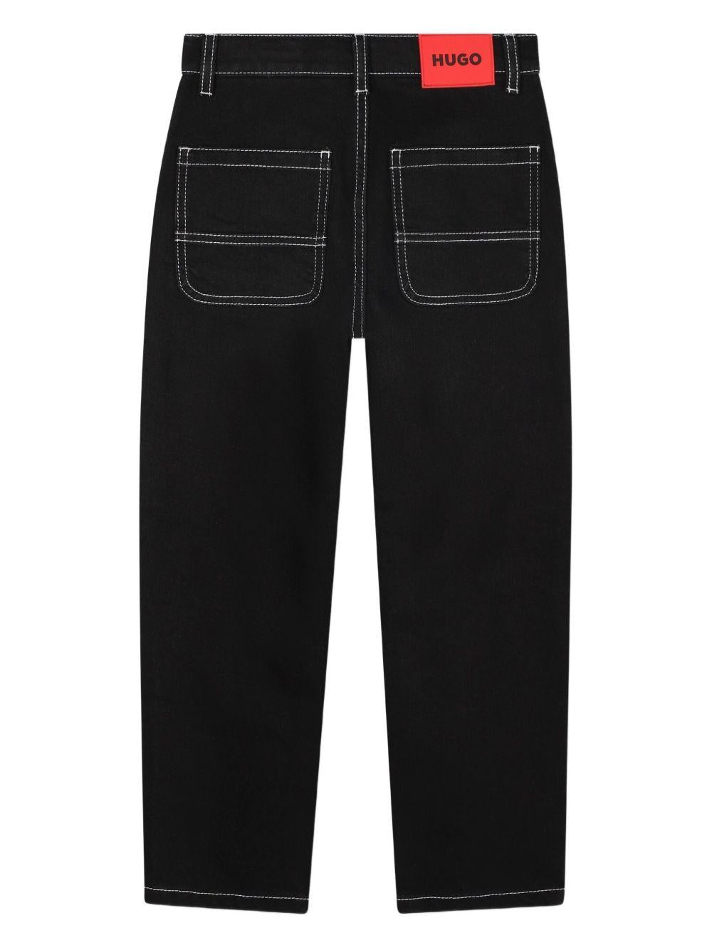 Jeans per bambino Hugo Kids neri con applicazione posteriore con logo - Rubino Kids