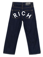 Jeans per bambino John Richmond Junior in denim blu con cinque tasche - Rubino Kids