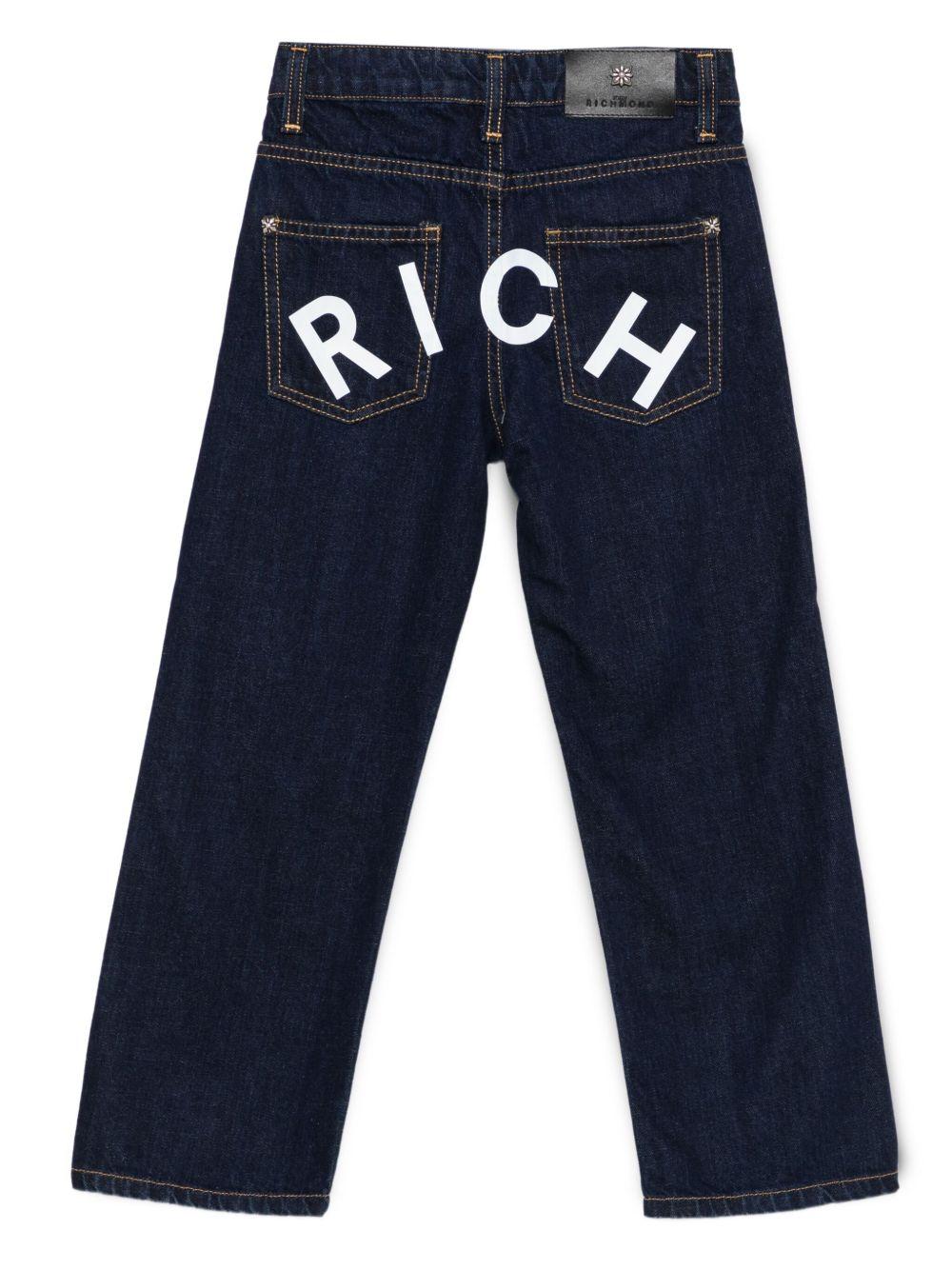 Jeans per bambino John Richmond Junior in denim blu con cinque tasche - Rubino Kids