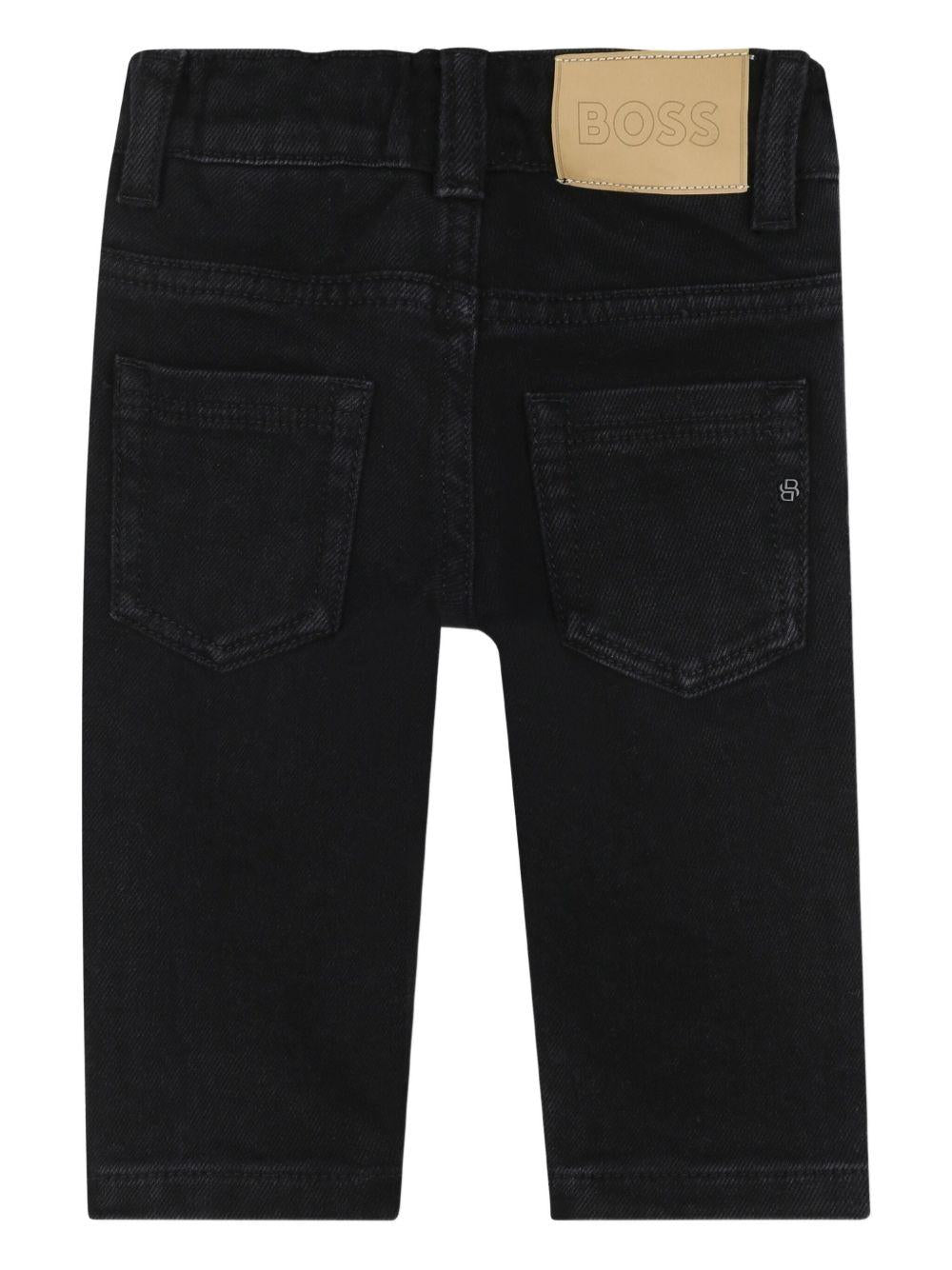 Jeans per neonato Boss Kidswear neri con applicazione posteriore con logo - Rubino Kids