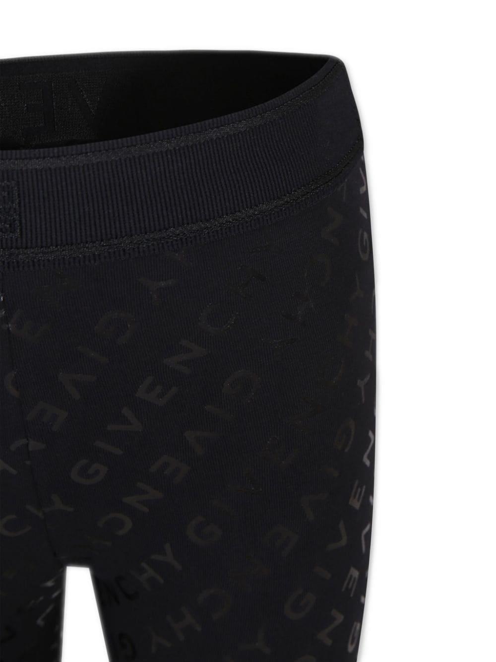 Leggings per bambina Givenchy Kids nero con stampa logo all - over - Rubino Kids
