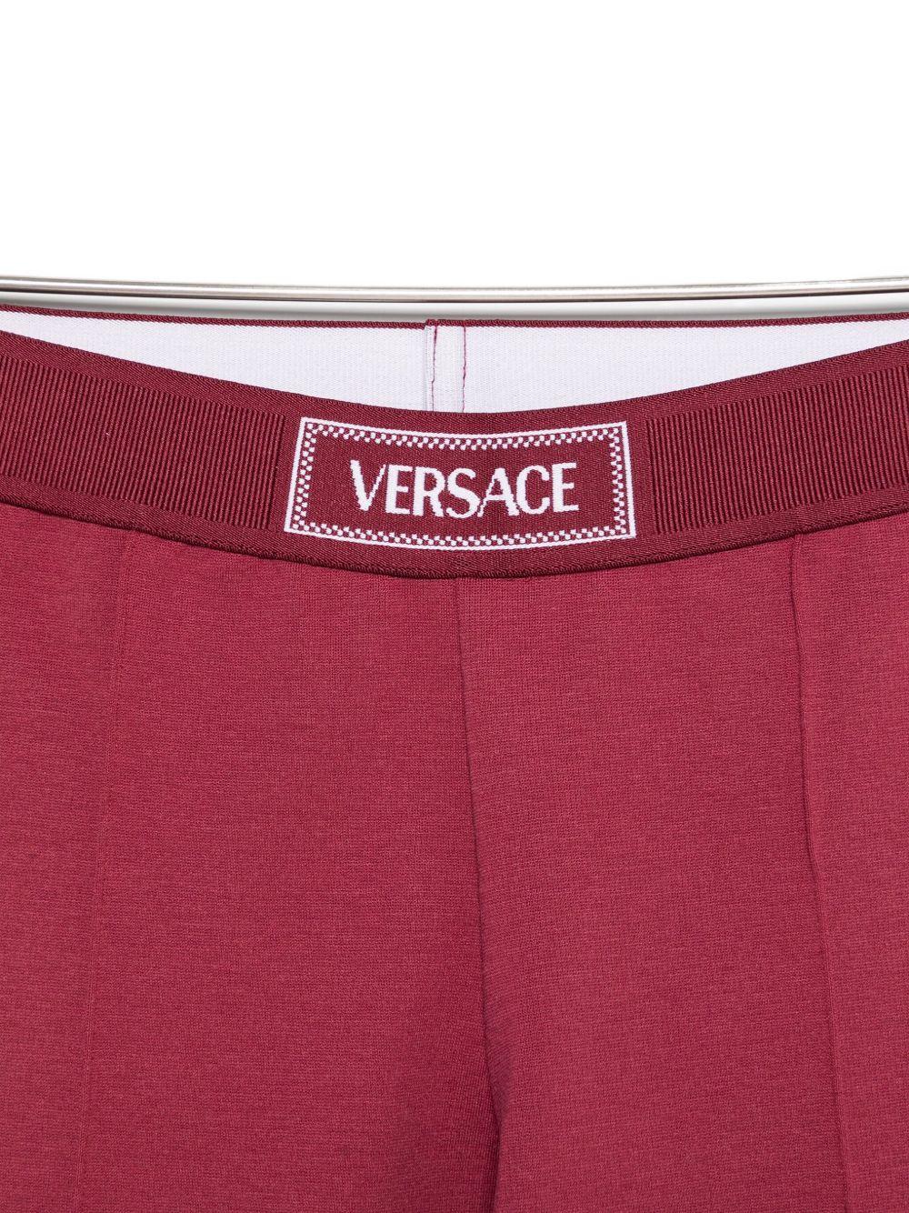 Leggings per bambina Versace Kids bordeaux con orlo con staffa - Rubino Kids