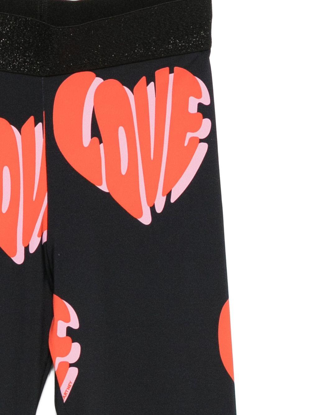 Leggins per bambina Stella McCartney Kids neri con motivo a cuore - Rubino Kids