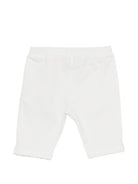 Leggins per neonata Moschino Kids bianchi con logo sul davanti - Rubino Kids