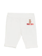 Leggins per neonata Moschino Kids bianchi con logo sul davanti - Rubino Kids