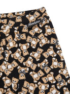 Leggins per neonata Moschino Kids neri con stampa Teddy Bear all - over - Rubino Kids