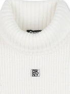 Maglione per bambina Dkny Kids bianco con collo alto - Rubino Kids