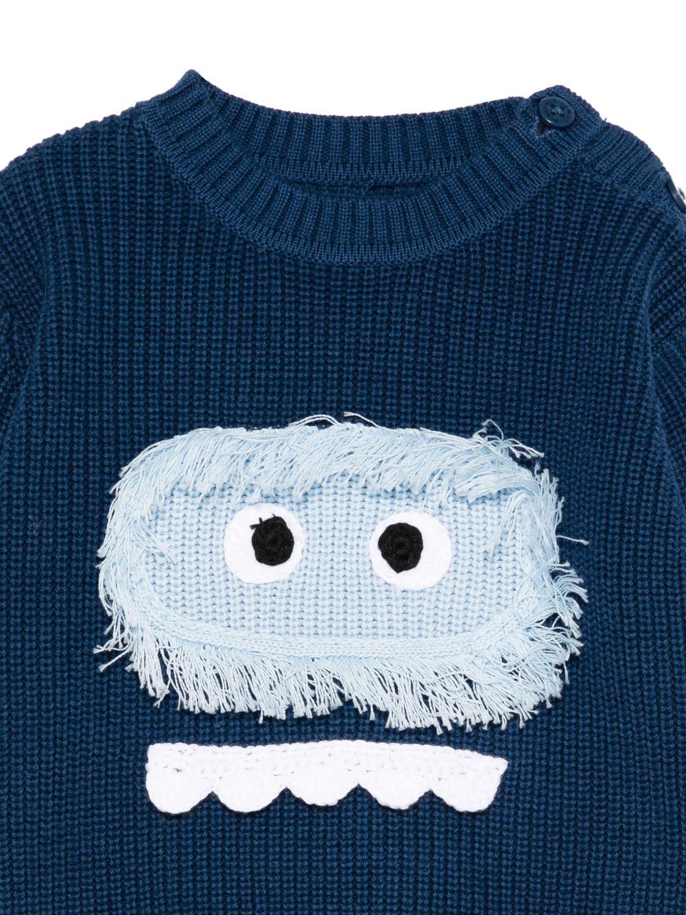 Maglione per neonato Stella McCartney Kids blu con faccia di mostro - Rubino Kids