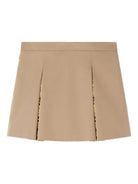 Minigonna plissettata per bambina Versace Kids beige con dettaglio laterale Medusa - Rubino Kids