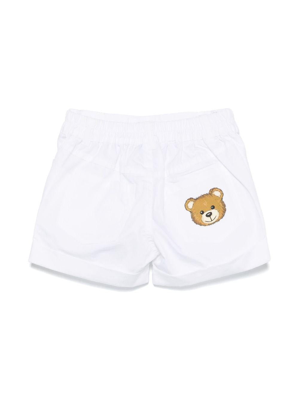 Pantaloncini con stampa logo per neonato Moschino Kids bianco con elastico in vita - Rubino Kids