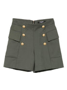 Pantaloncini per bambina Balmain Kids verde con tasche e bottoni - Rubino Kids
