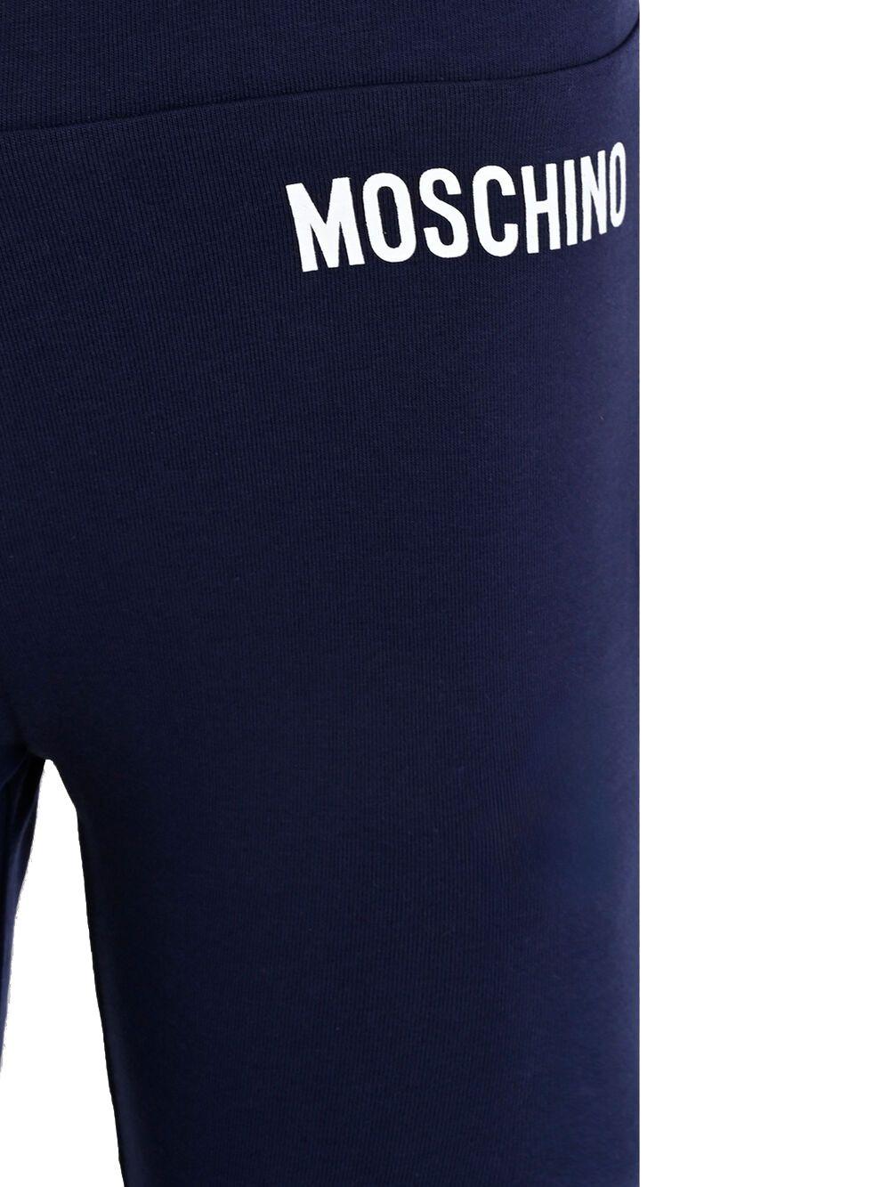 Pantaloni affusolati per bambina Moschino Kids blu con dettaglio logo in vita - Rubino Kids