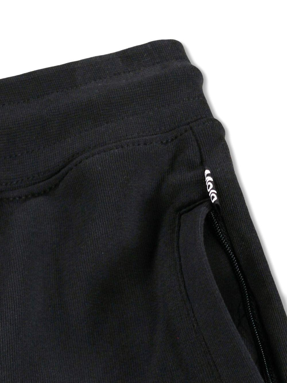 Pantaloni Alvar per bambino Molo neri con quadrante con smiley - Rubino Kids