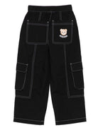 Pantaloni cargo per bambino Moschino Kids nero con cuciture a contrasto - Rubino Kids