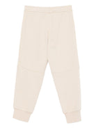 Pantaloni da tuta per bambino Emporio Armani Kids beige con logo - Rubino Kids