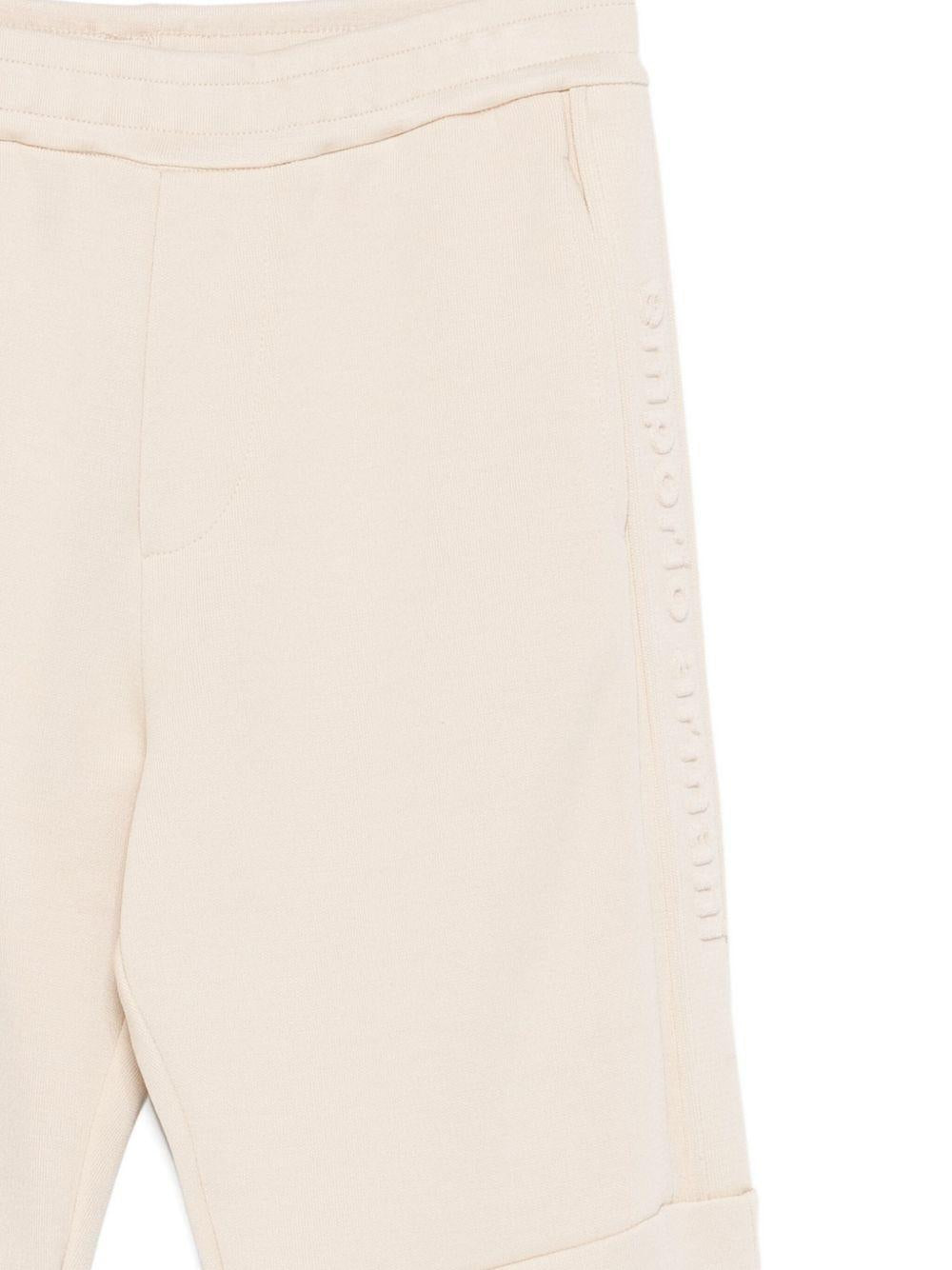 Pantaloni da tuta per bambino Emporio Armani Kids beige con logo - Rubino Kids