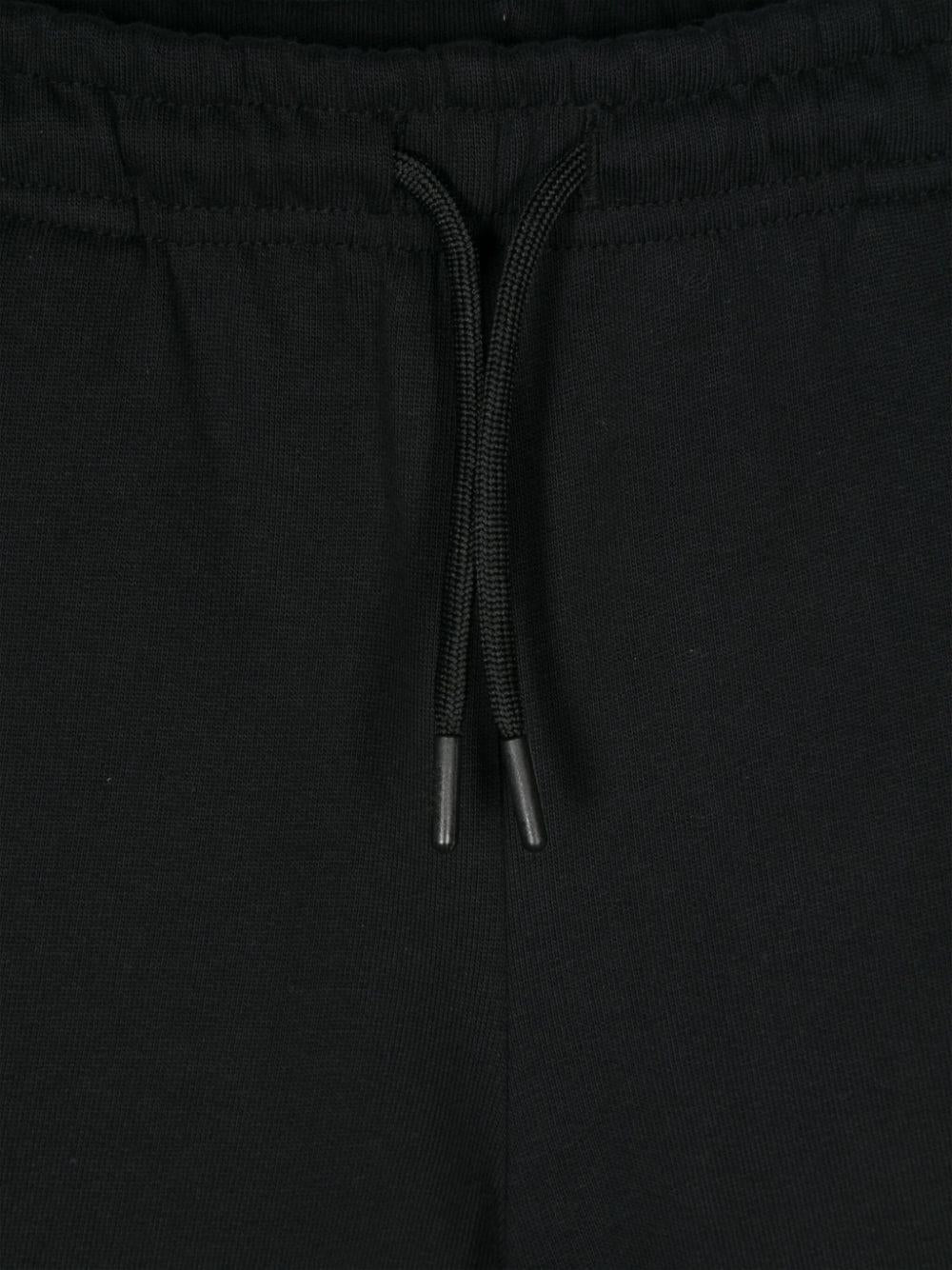 Pantaloni da tuta per bambino MSGM Kids nero con stampa logo - Rubino Kids