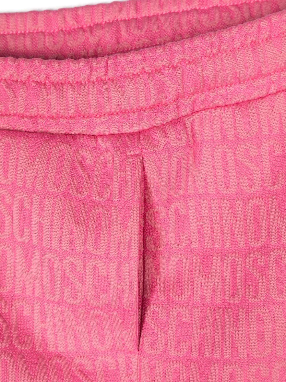 Pantaloni dritti per bambina Moschino Kids rosa con logo goffrato e vita elasticizzata - Rubino Kids