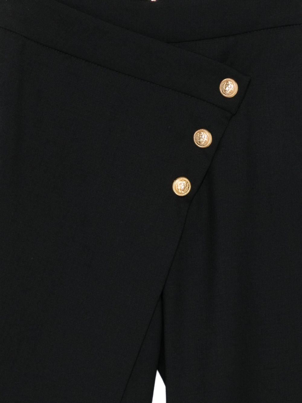 Pantaloni per bambina Balmain Kids neri con bottoni - Rubino Kids