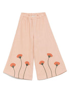 Pantaloni per bambina Donsje Fifis rosa con applicazione a fiori - Rubino Kids