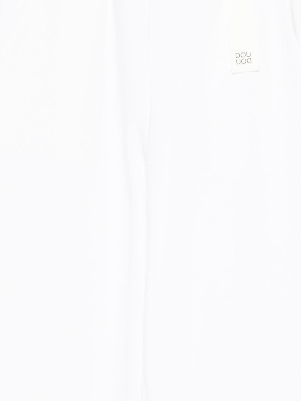 Pantaloni per bambina Douuod Kids bianchi con gamba larga - Rubino Kids