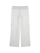 Pantaloni per bambina Givenchy Kids grigi con logo jacquard all - over - Rubino Kids
