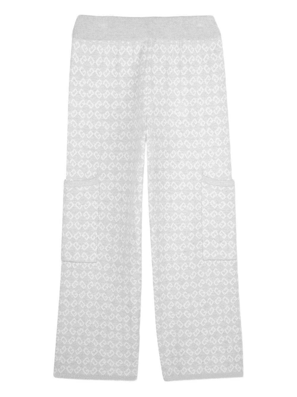 Pantaloni per bambina Givenchy Kids grigi con logo jacquard all - over - Rubino Kids