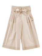 Pantaloni per bambina Monnalisa beige con dettaglio fiocco - Rubino Kids