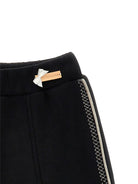 Pantaloni per bambina Monnalisa neri con placca con logo - Rubino Kids