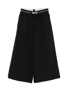 Pantaloni per bambina MSGM Kids neri con dettaglio logo - Rubino Kids