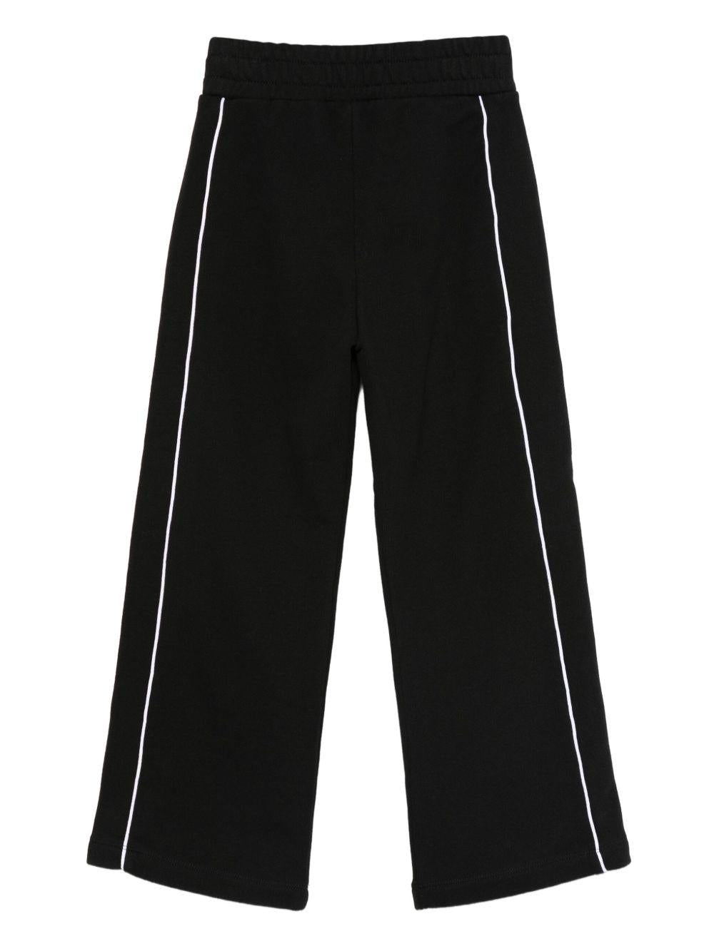 Pantaloni per bambina Off - White Kids neri con righe laterali bianche - Rubino Kids