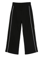 Pantaloni per bambina Off - White Kids neri con righe laterali bianche - Rubino Kids