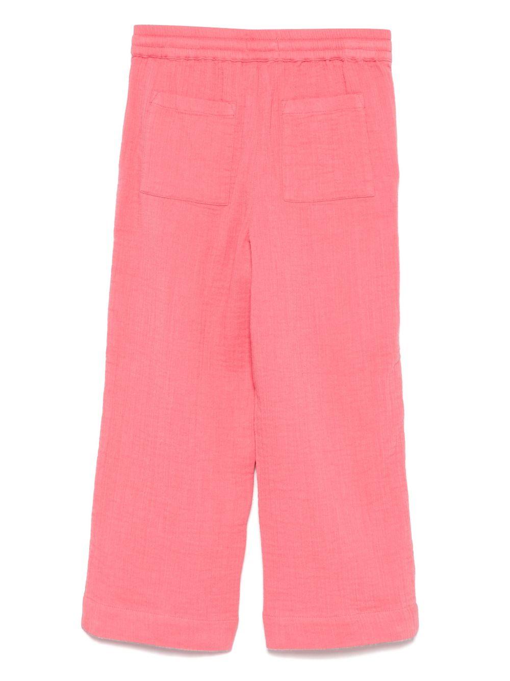 Pantaloni per bambina Scotch & Soda Kids rosa con effetto stropicciato - Rubino Kids