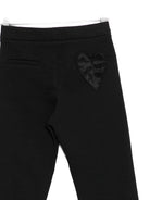 Pantaloni per bambina Simonetta nero con decorazione a cuore - Rubino Kids