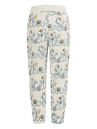 Pantaloni per bambina Stella McCartney Kids bianchi con logo all - over - Rubino Kids