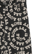 Pantaloni per bambina Stella McCartney Kids nero stampati Love is All - Rubino Kids