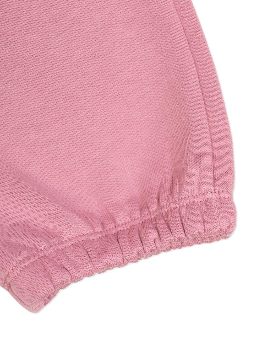 Pantaloni per bambina Stella McCartney Kids rosa con tasca con stampa floreale - Rubino Kids