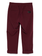 Pantaloni per bambini MSGM Kids bordeaux con elastico in vita e orli svasati - Rubino Kids