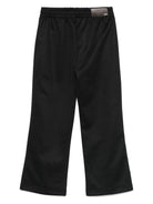 Pantaloni per bambino Amiri Kids neri con righe laterali - Rubino Kids