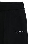 Pantaloni per bambino Balmain Kids nero con polsini elasticizzati - Rubino Kids