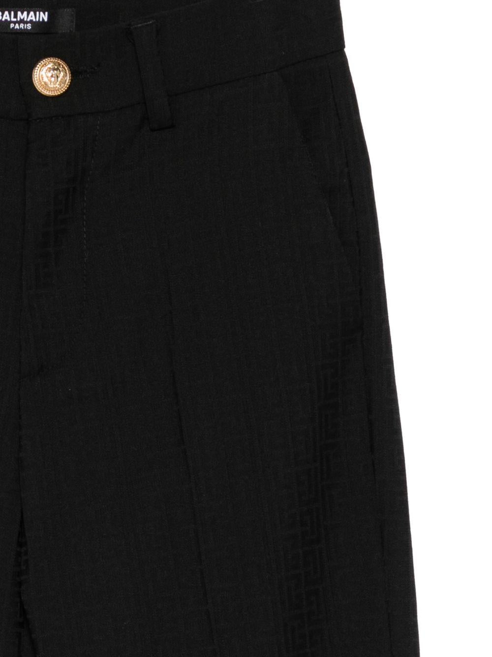 Pantaloni per bambino Balmain Kids nero in lana vergine - Rubino Kids